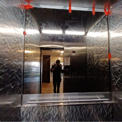 Elevator-mirror-replacement